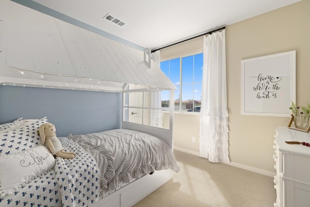 bedroom featuring carpet floors, baseboards, and visible vents