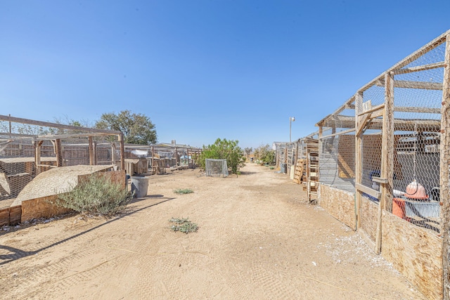 view of yard with an outdoor structure