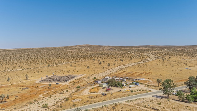 birds eye view of property featuring a rural view