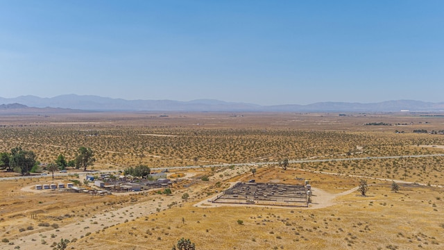 aerial view with a mountain view and a rural view