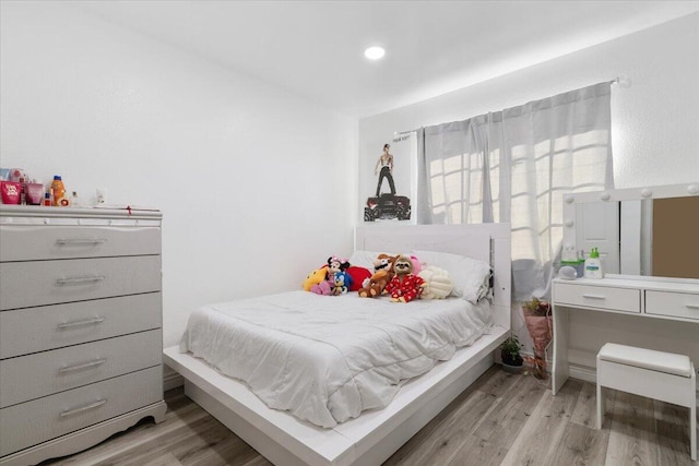 bedroom featuring light hardwood / wood-style flooring