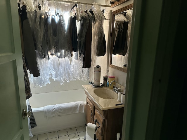 bathroom featuring vanity, shower / bathtub combination with curtain, and tile patterned flooring