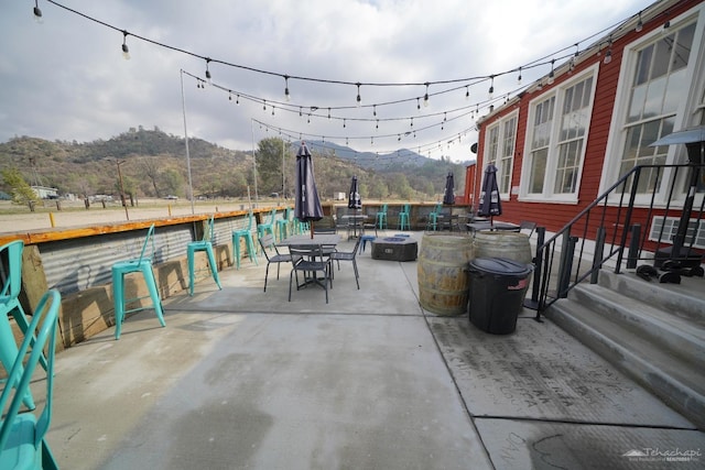 15782 Caliente Creek Rd, Caliente, CA 93518 - view of patio featuring a fire pit, outdoor dining area, and a mountain view