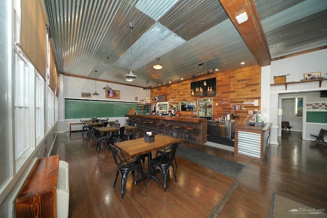 dining area with wood finished floors