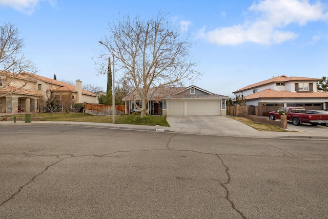 view of front of home with a garage and a front yard