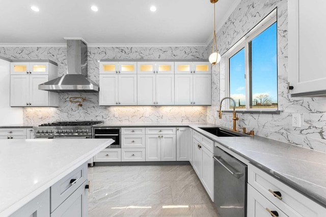 42730 W 23rd St, Lancaster, CA 93536 - kitchen with white cabinetry, stainless steel appliances, and wall chimney exhaust hood