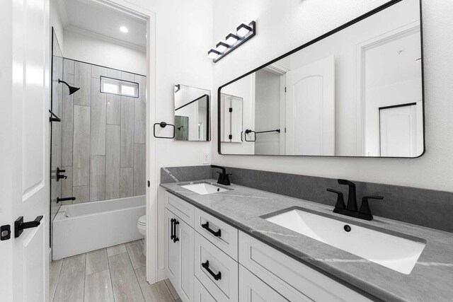 42730 W 23rd St, Lancaster, CA 93536 - full bathroom featuring tiled shower / bath, vanity, and toilet