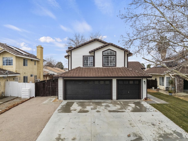 view of front of property featuring a garage