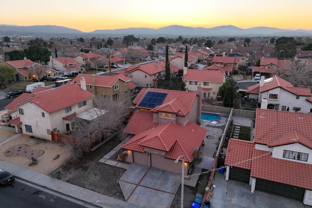 aerial view at dusk with a mountain view