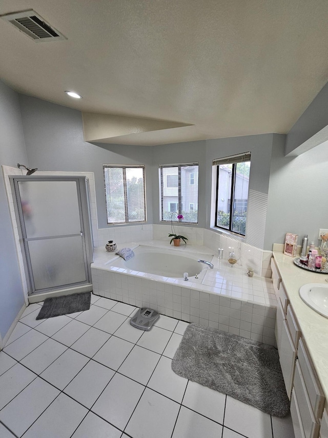 403 Sunrise Ter, Palmdale, CA 93551 - full bathroom featuring visible vents, a bath, plenty of natural light, and a stall shower