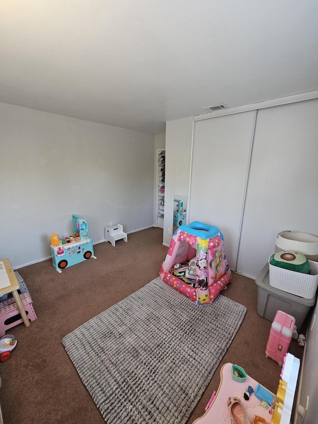 403 Sunrise Ter, Palmdale, CA 93551 - bedroom with visible vents, carpet, and a closet