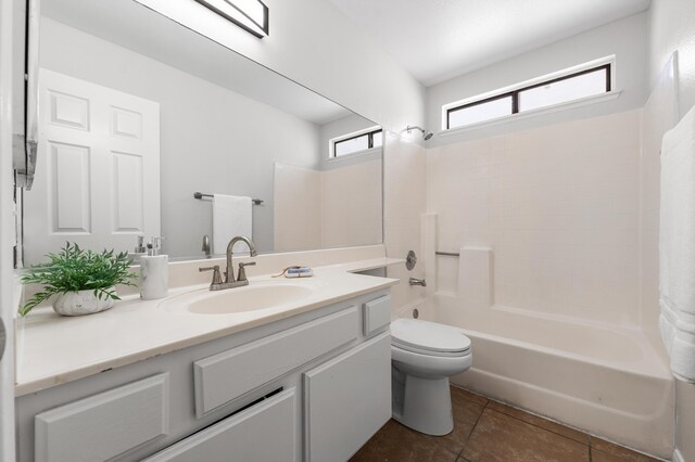 38115 E 41st St, Palmdale, CA 93552 - bathroom featuring shower / bathtub combination with curtain, vanity, toilet, and tile patterned floors