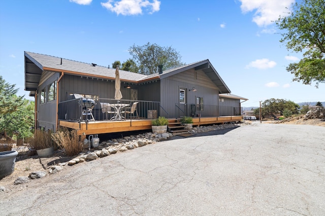 view of front of property with a deck