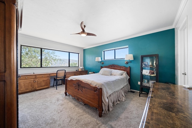 bedroom with light colored carpet, ceiling fan, and ornamental molding