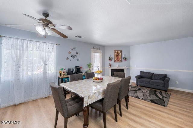 43656 E 5th St, Lancaster, CA 93535 - dining room with light wood-style floors and ceiling fan