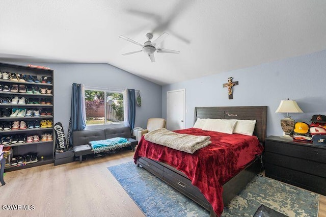 43656 E 5th St, Lancaster, CA 93535 - bedroom with wood finished floors, lofted ceiling, and a ceiling fan