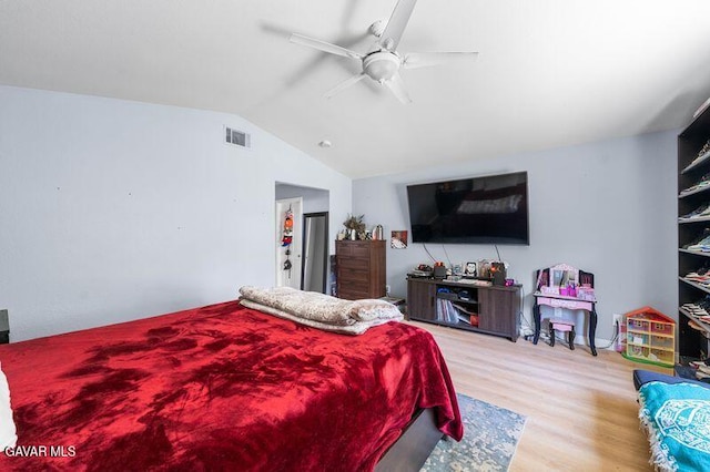 43656 E 5th St, Lancaster, CA 93535 - bedroom with wood finished floors, vaulted ceiling, and ceiling fan