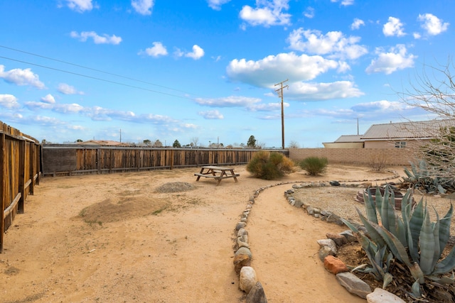 view of yard with a fenced backyard