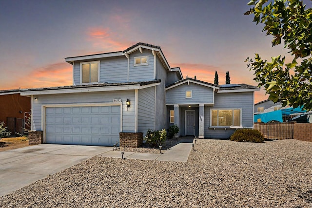 view of front property with a garage