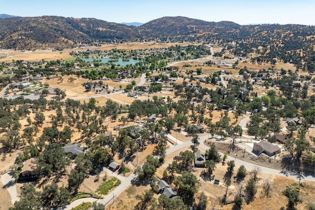 bird's eye view featuring a water and mountain view