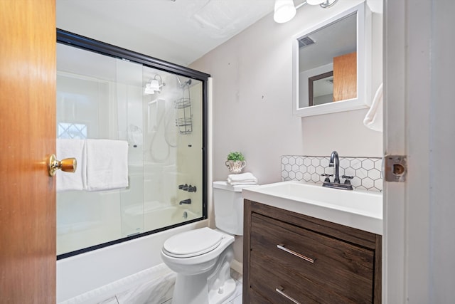 full bathroom with vanity, toilet, bath / shower combo with glass door, and backsplash