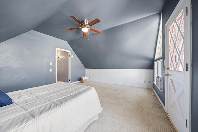 bedroom featuring light colored carpet, ceiling fan, and lofted ceiling