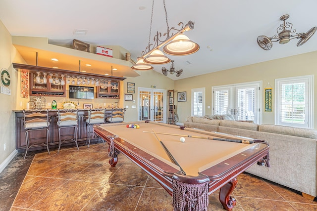 recreation room with ceiling fan, french doors, billiards, bar area, and vaulted ceiling