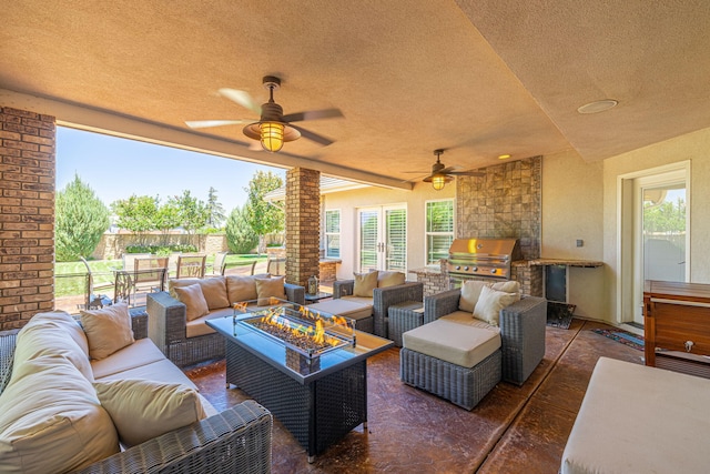 view of patio / terrace featuring grilling area, an outdoor living space, and ceiling fan