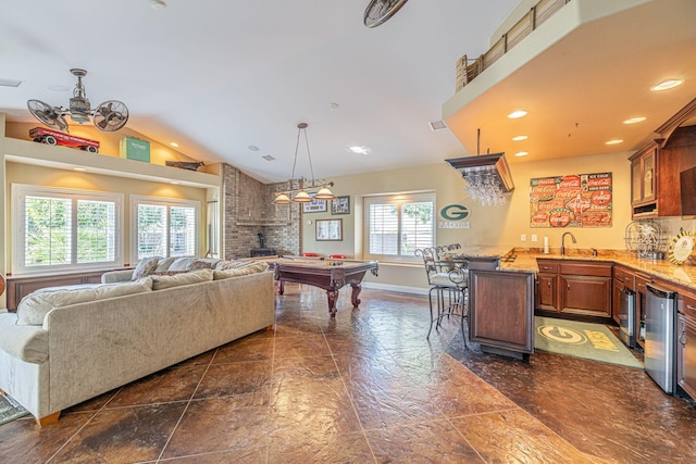 playroom featuring lofted ceiling, indoor wet bar, and pool table