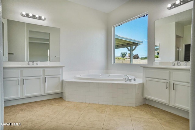 41729 Firenze St, Lancaster, CA 93536 - full bath with two vanities, a garden tub, and tile patterned floors