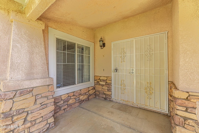 4068 Vancouver Ln, Quartz Hill, CA 93536 - entrance to property with stone siding and stucco siding