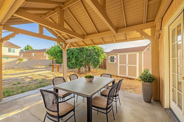 4068 Vancouver Ln, Quartz Hill, CA 93536 - fenced backyard with a patio, a storage unit, and outdoor dining area