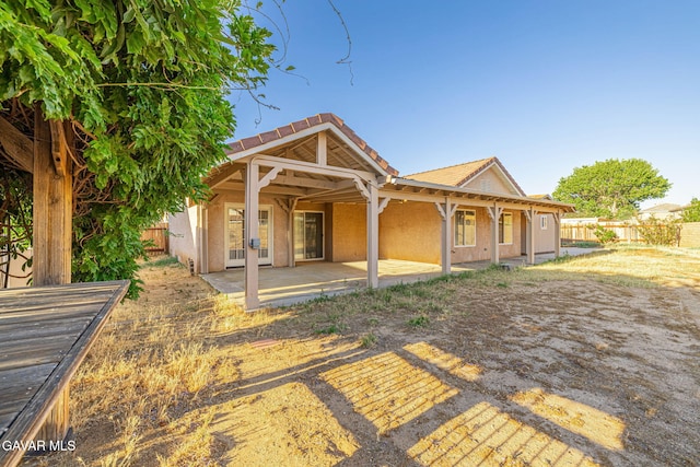 4068 Vancouver Ln, Quartz Hill, CA 93536 - rear view of property featuring a patio area and stucco siding