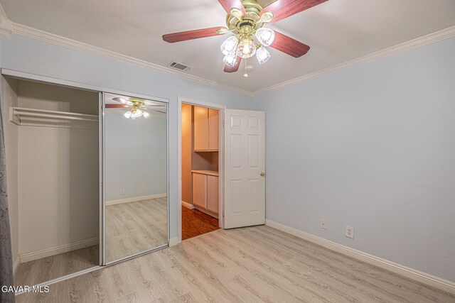 4068 Vancouver Ln, Quartz Hill, CA 93536 - unfurnished bedroom featuring wood finished floors, crown molding, a closet, and ceiling fan