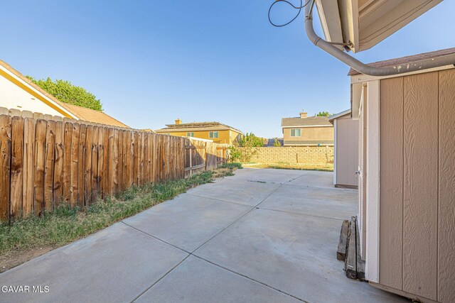 4068 Vancouver Ln, Quartz Hill, CA 93536 - fenced backyard with a patio