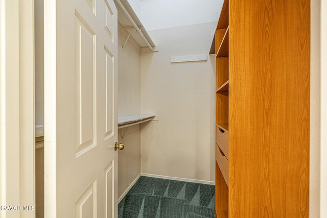 4068 Vancouver Ln, Quartz Hill, CA 93536 - spacious closet featuring dark carpet