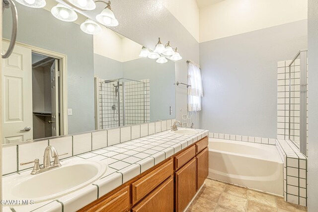 4068 Vancouver Ln, Quartz Hill, CA 93536 - full bath with double vanity, a garden tub, and tiled shower