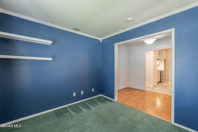 4068 Vancouver Ln, Quartz Hill, CA 93536 - carpeted empty room featuring ornamental molding, a smoke detector, wood finished floors, and a textured wall