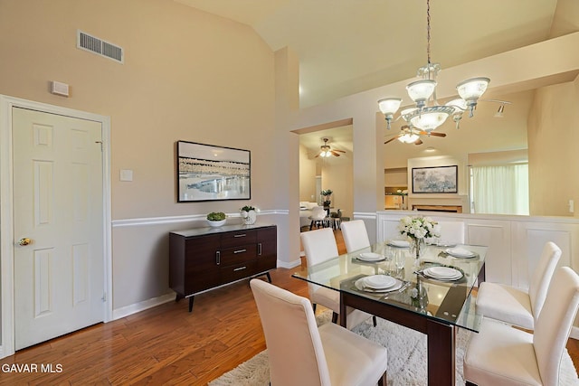 4068 Vancouver Ln, Quartz Hill, CA 93536 - dining space with ceiling fan, wood finished floors, a chandelier, and high vaulted ceiling