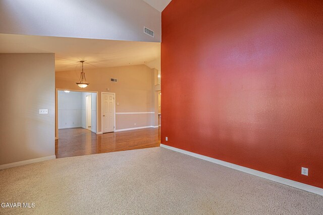 4068 Vancouver Ln, Quartz Hill, CA 93536 - unfurnished room with carpet flooring and vaulted ceiling