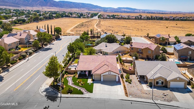 42409 W 66th St, Lancaster, CA 93536 - aerial perspective of suburban area with a mountain backdrop