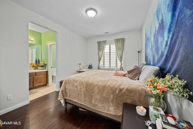 42409 W 66th St, Lancaster, CA 93536 - bedroom with wood finished floors and ensuite bath
