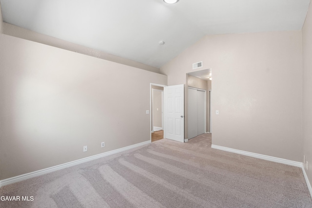 4633 Dowel Ave, Palmdale, CA 93552 - unfurnished room featuring light colored carpet and high vaulted ceiling