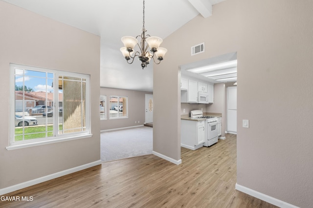 4633 Dowel Ave, Palmdale, CA 93552 - unfurnished dining area featuring a chandelier, beamed ceiling, light wood finished floors, and high vaulted ceiling