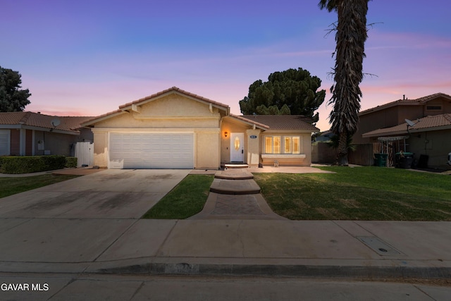 4633 Dowel Ave, Palmdale, CA 93552 - ranch-style home featuring a garage, stucco siding, concrete driveway, and a tile roof
