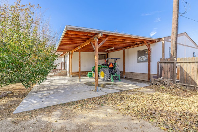 view of patio featuring a carport