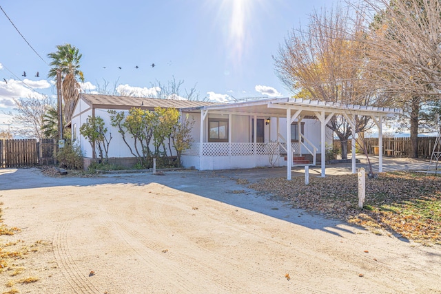 view of front of home featuring a pergola