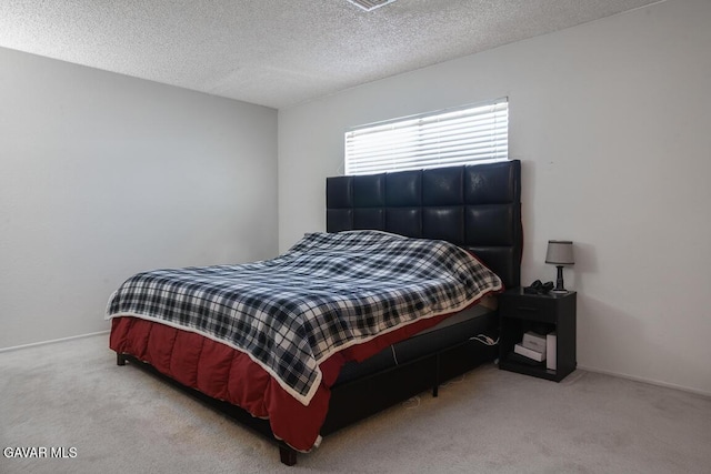 425 W W Ave J5, Unit 37, Lancaster, CA 93534 - carpeted bedroom featuring a textured ceiling