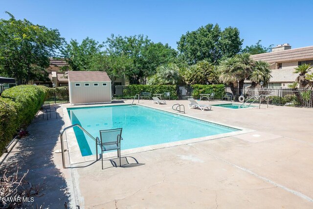 425 W W Ave J5, Unit 37, Lancaster, CA 93534 - community pool featuring a patio area