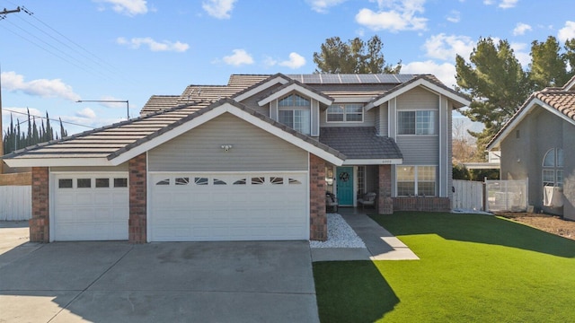 view of front facade featuring a front lawn and solar panels